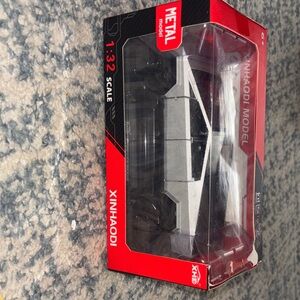 Tesla Silver and Black Toy Car